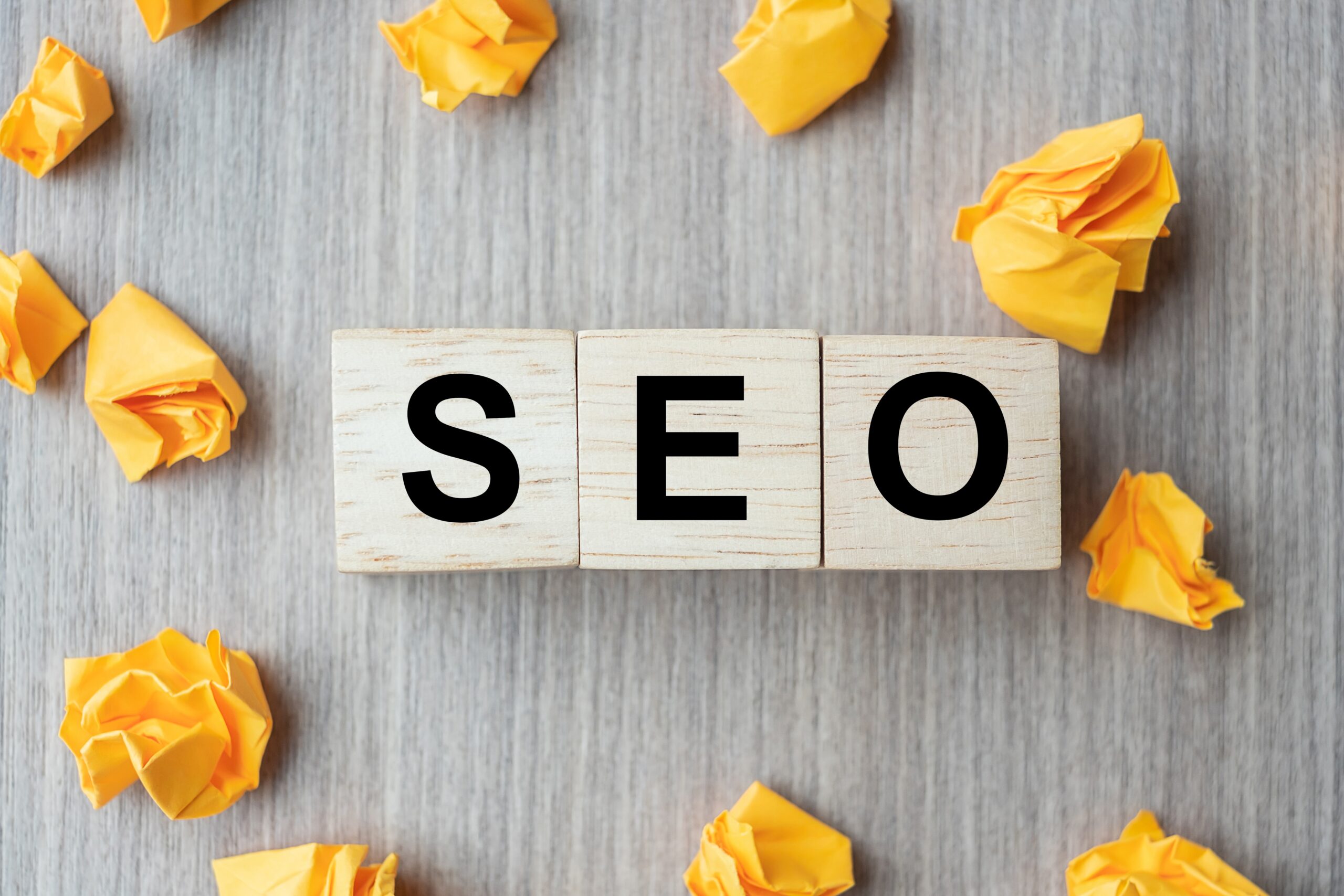 Three wooden blocks that spell out SEO.